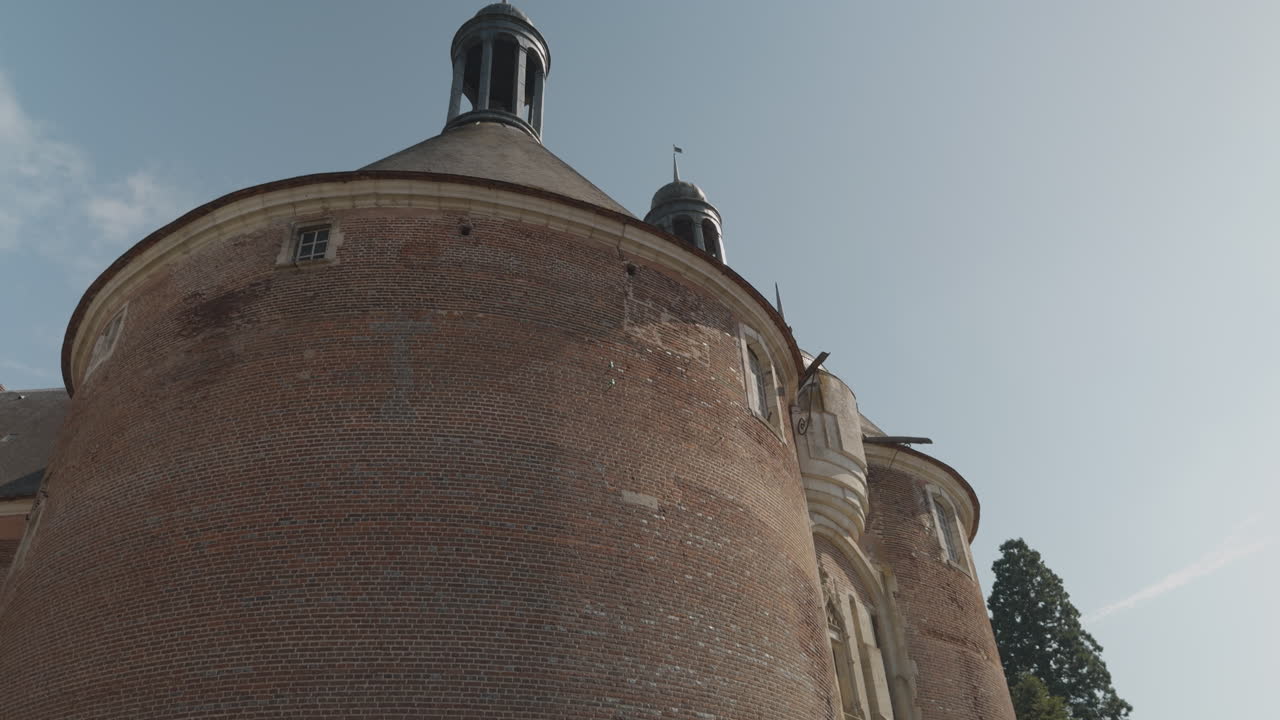 Capturing of architecture of Castle of Saint-Fargeau against a blue sky in France