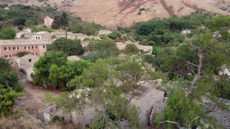 orbit view revealing old perithia village, corfu, greece