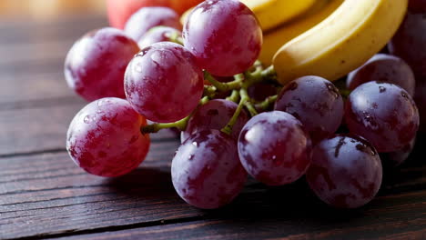 fresh fruits on wooden table