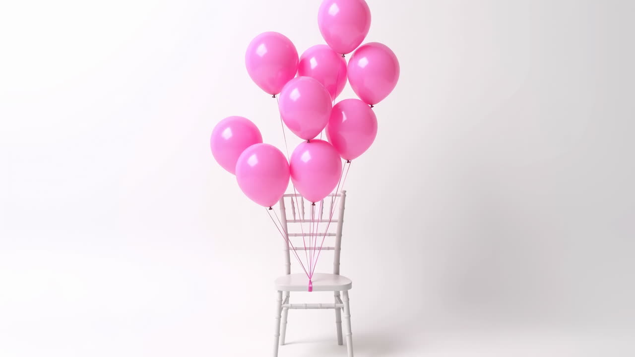 Palloncini rosa legati a una sedia bianca su sfondo bianco.