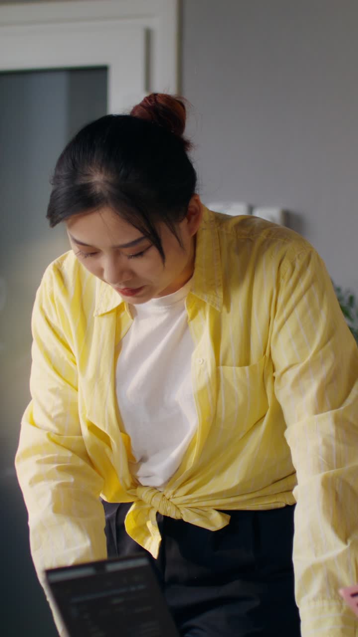 Woman Working on Tablet