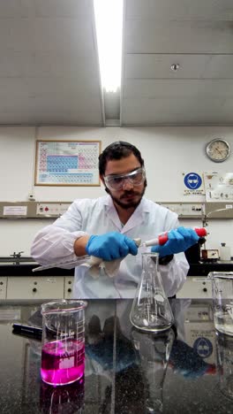 scientific environment with researcher and flask