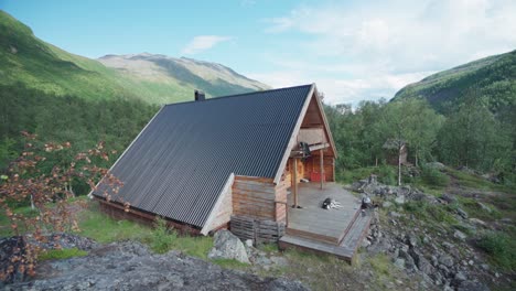 isolated cabin amidst scenic mountain landscape in lyngsdalen, norway