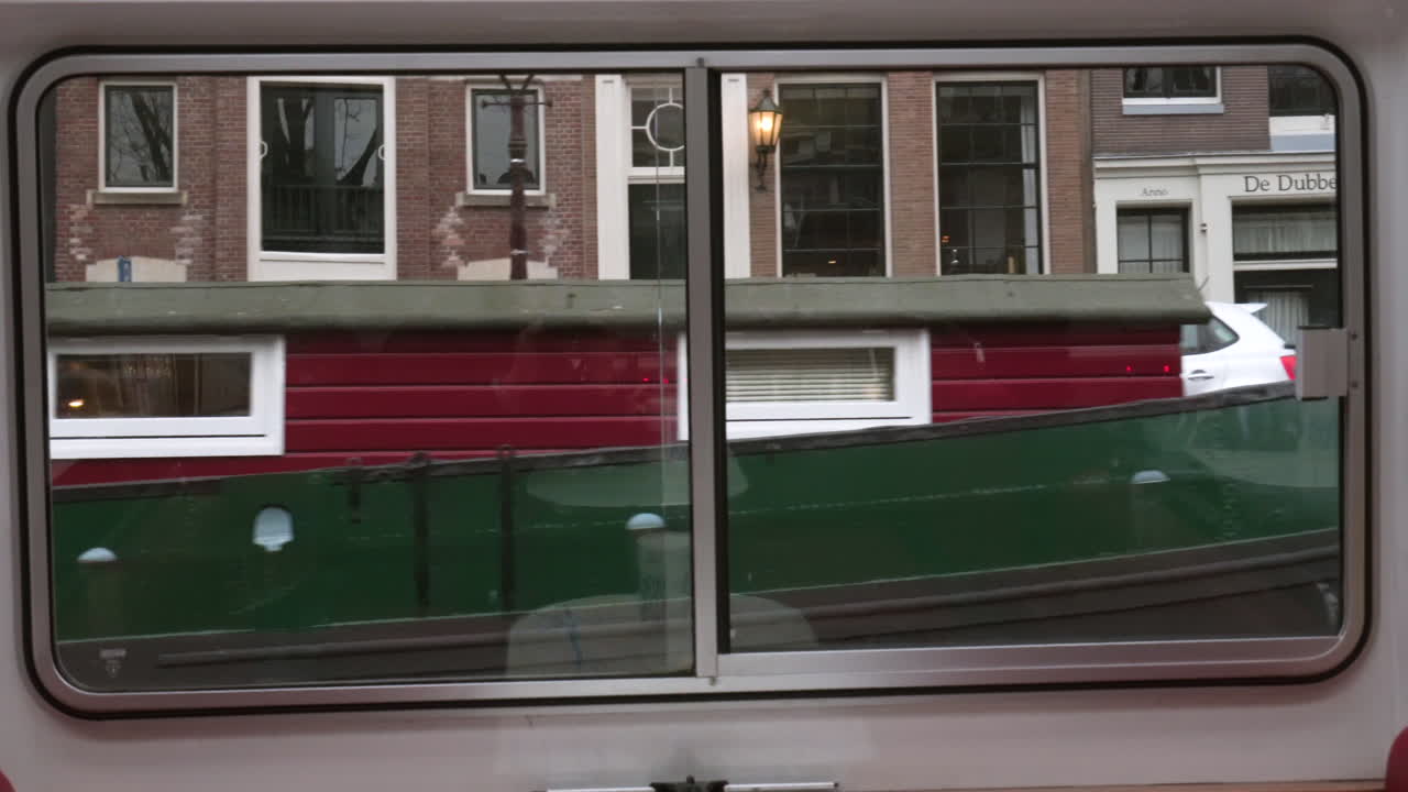 Reflections of Amsterdam from a Window