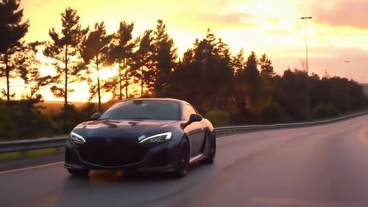 Elegante coche deportivo conduciendo por una carretera panorámica al atardecer