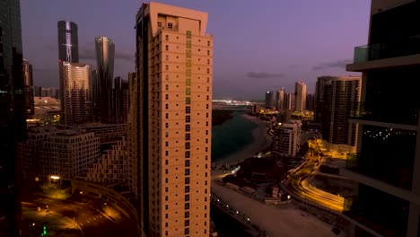 nighttime to sunrise and then all day time lapse of abu dhabi in the united arab emirates