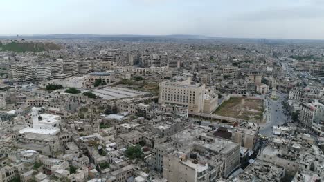 aleppo in syria 10 years after the civil war. we can see the city all over the horizon in aerial view 4k