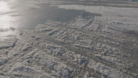 Slow-push-over-an-icy-parking-lot