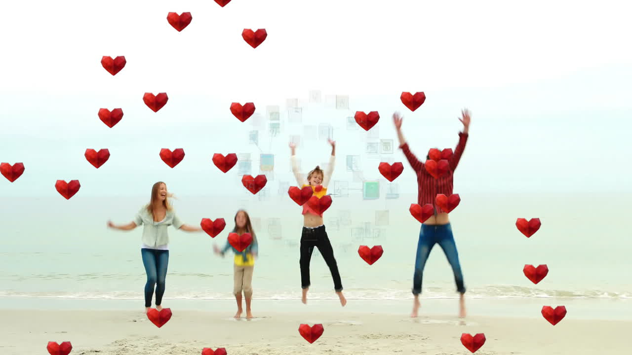 Jumping on beach, family with animated red hearts floating around them