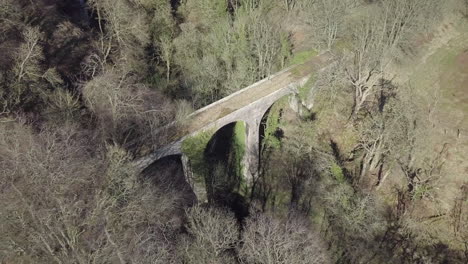 aerial footage den finella disused viaduct on a sunny day in aberdeenshire, scotland