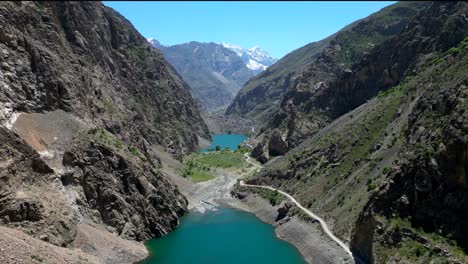 Fast-moving-drone-shot-flying-through-mountain-range-in-Tajikistan