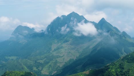 breathtaking mountain range covered in mist and cloud over vietnam