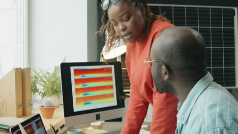 african american engineers working on sustainable energy project