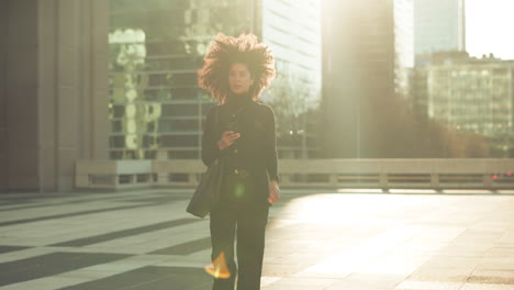 urban, phone and walking professional woman