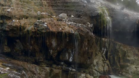 waterfall cascading down rocks in boise national forest, idaho, united states - tilt down