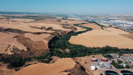 aerial view of rural landscape with water treatment plant