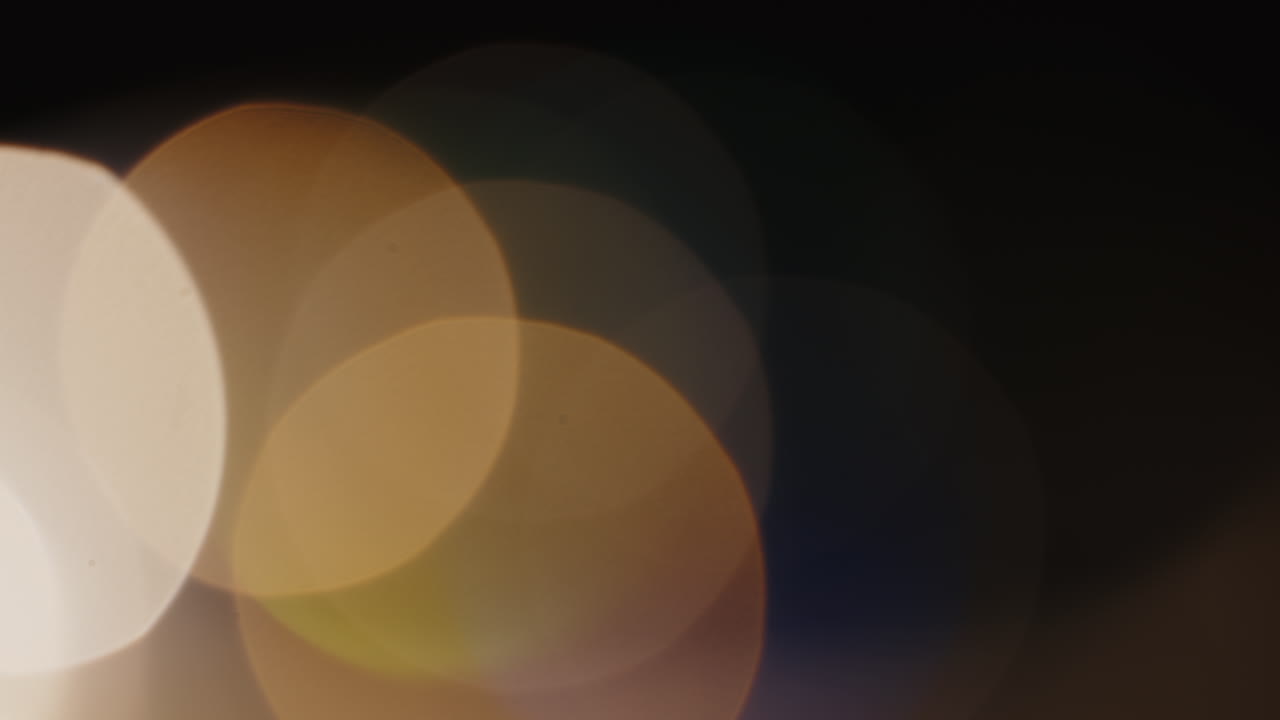 プロジェクト用の光漏れ 4k 映像、光学的グロー レンズ フレア ボケ味トランジション オーバーレイの背景