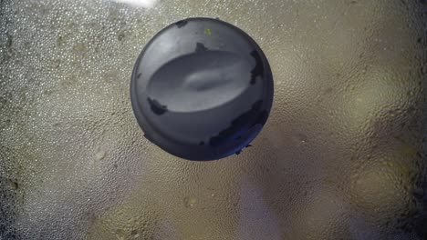 close-up of a glass lid on a pot