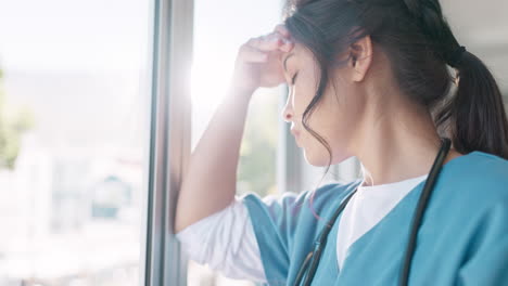 woman doctor, headache and burnout by window