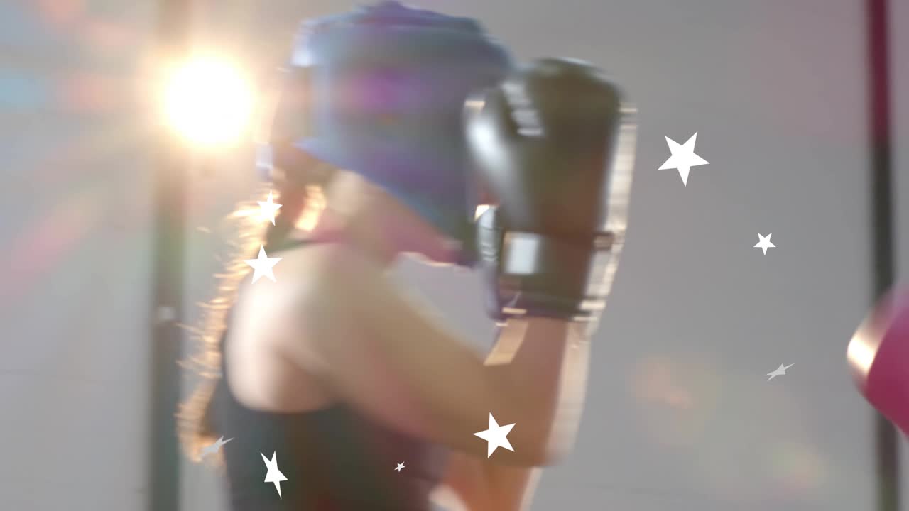 Female boxer in blue headgear starting boxing by stepping in, jabbing, blocking with star overlays