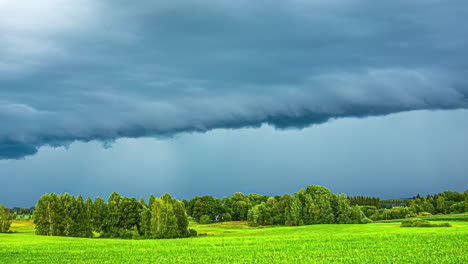 Sunset-Serenity:-Enchanting-Timelapse-of-Rain-Clouds-over-Lush-Green-Fields