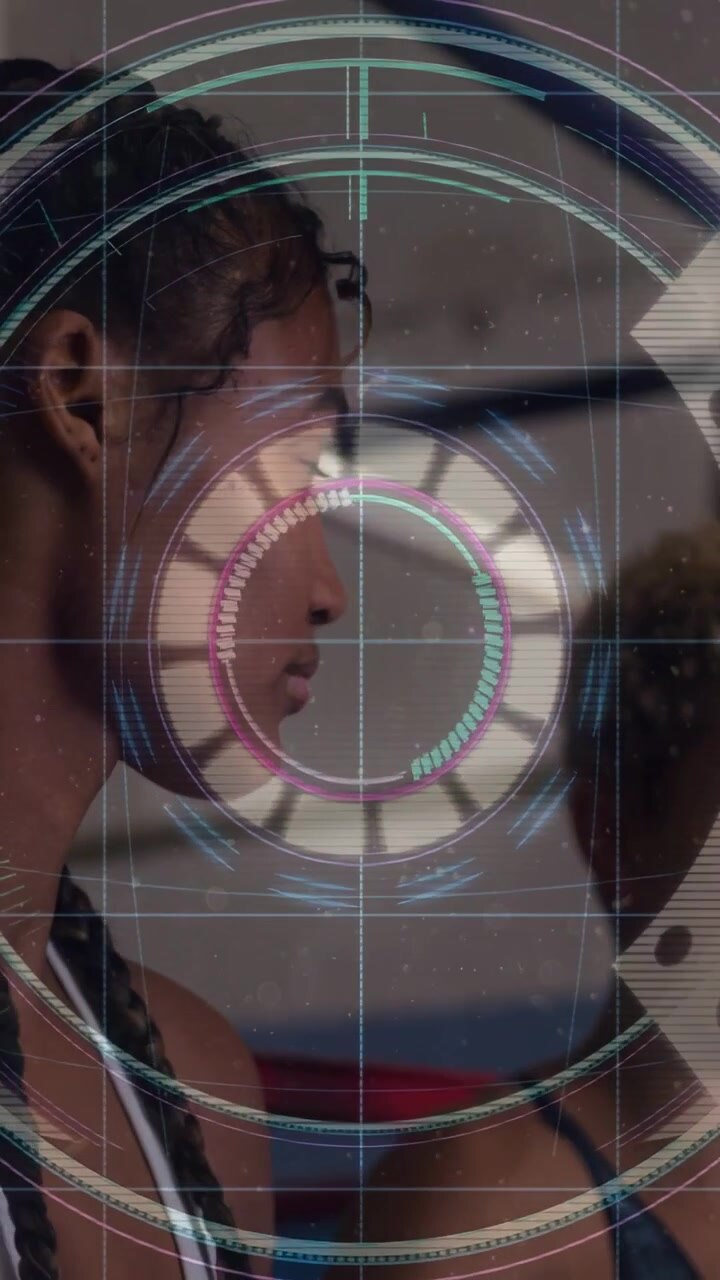 Vertical video: Woman holding still HUD activating scanning face for fitness fading showing partner