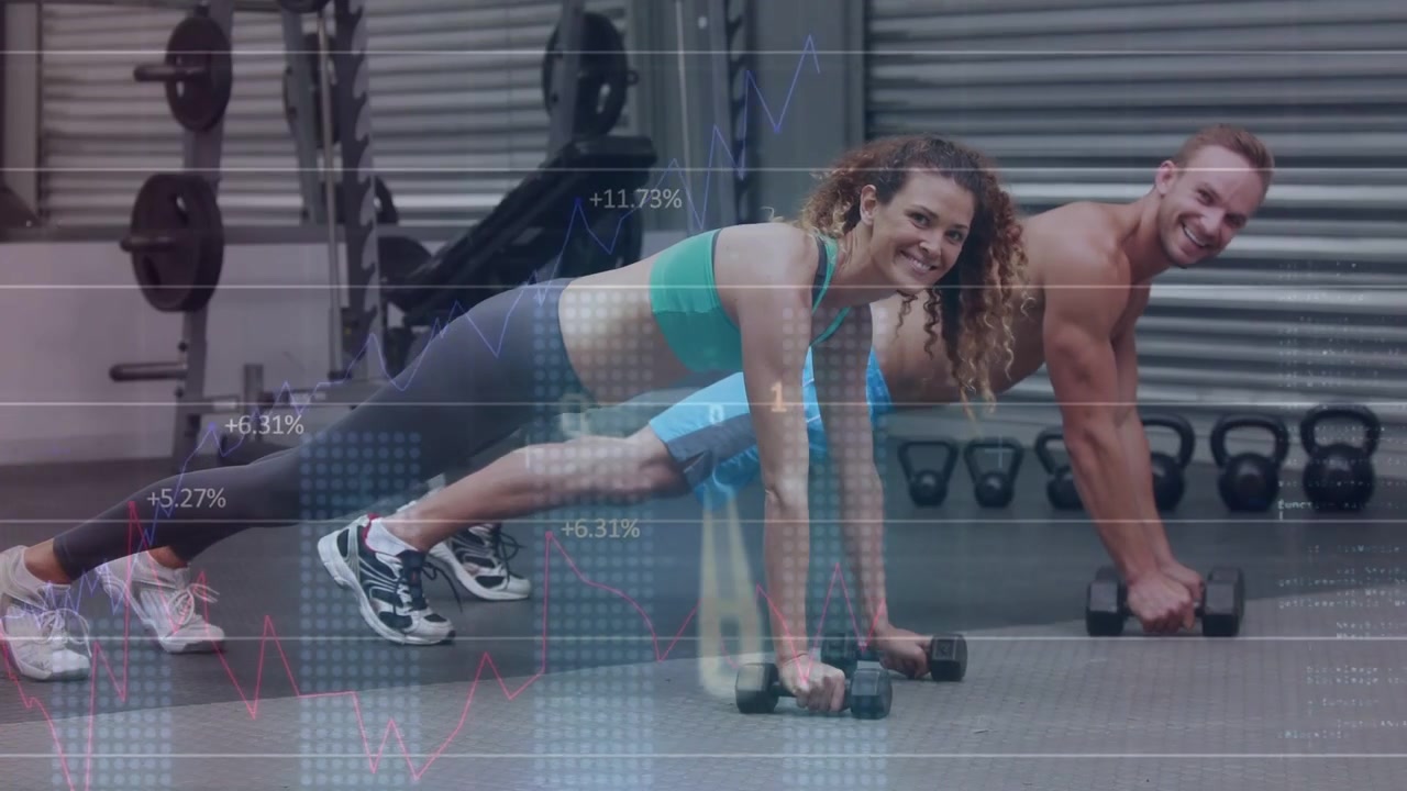 Workout partners holding plank on rubber mat, alternating dumbbell rows for strength, graph passing