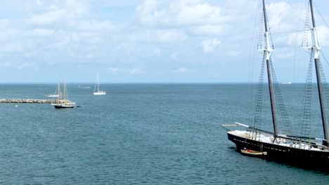 fast air surface view of vineyard haven full of sailing vessel with mast