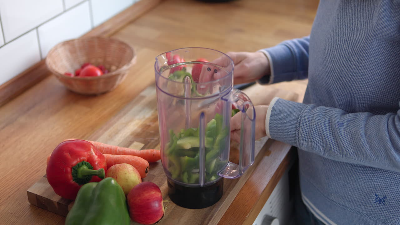 Preparing healthy food with blender