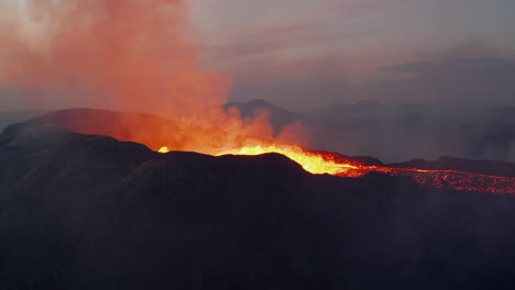 Aerial-view-of-boiling-lava-in-volcano-crater.-Close-up-view-of-material-splashing-above-surface.-Power-of-nature.-Fagradalsfjall-volcano.-Iceland,-2021