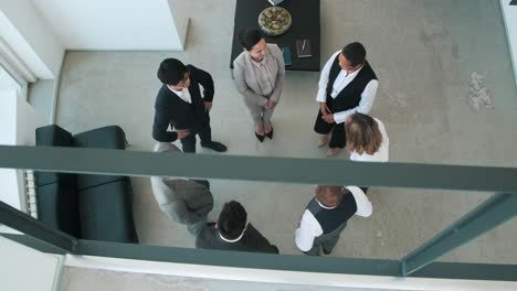 group of office workers talking top view