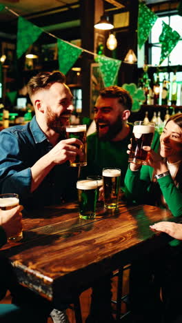 friends celebrating st. patrick's day at a bar
