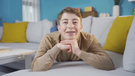 Positive-teenager-smiling-looking-at-camera.