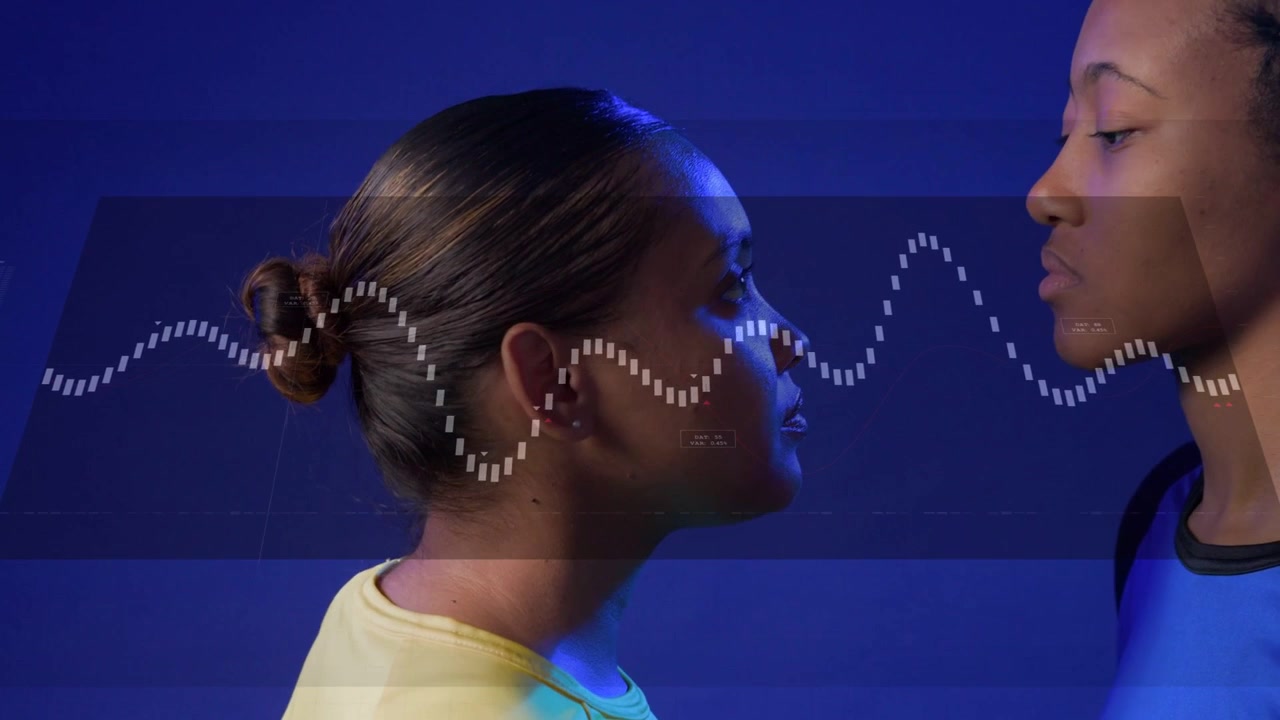 Left woman moving, right woman entering, two women syncing breath to start audio waveform panel