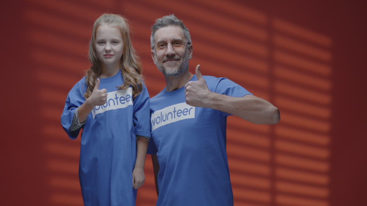 Father and daughter volunteering together
