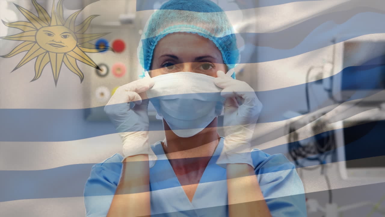Animação da bandeira do Uruguai tremulando sobre cirurgiã em sala de cirurgia