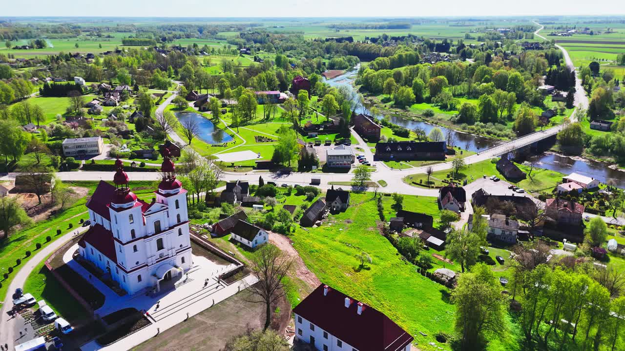 Aerial panoramic landscape of Baroque Lithuanian countryside, establishing at daylight