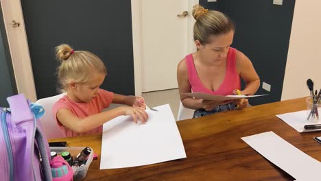 mother and daughter doing art project