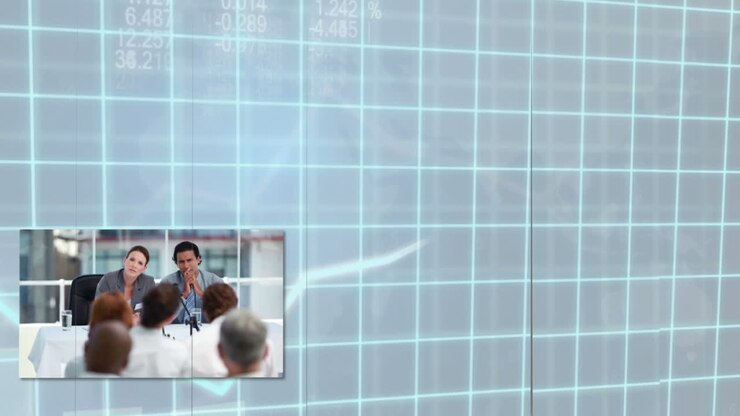 Business people assisting at a meeting