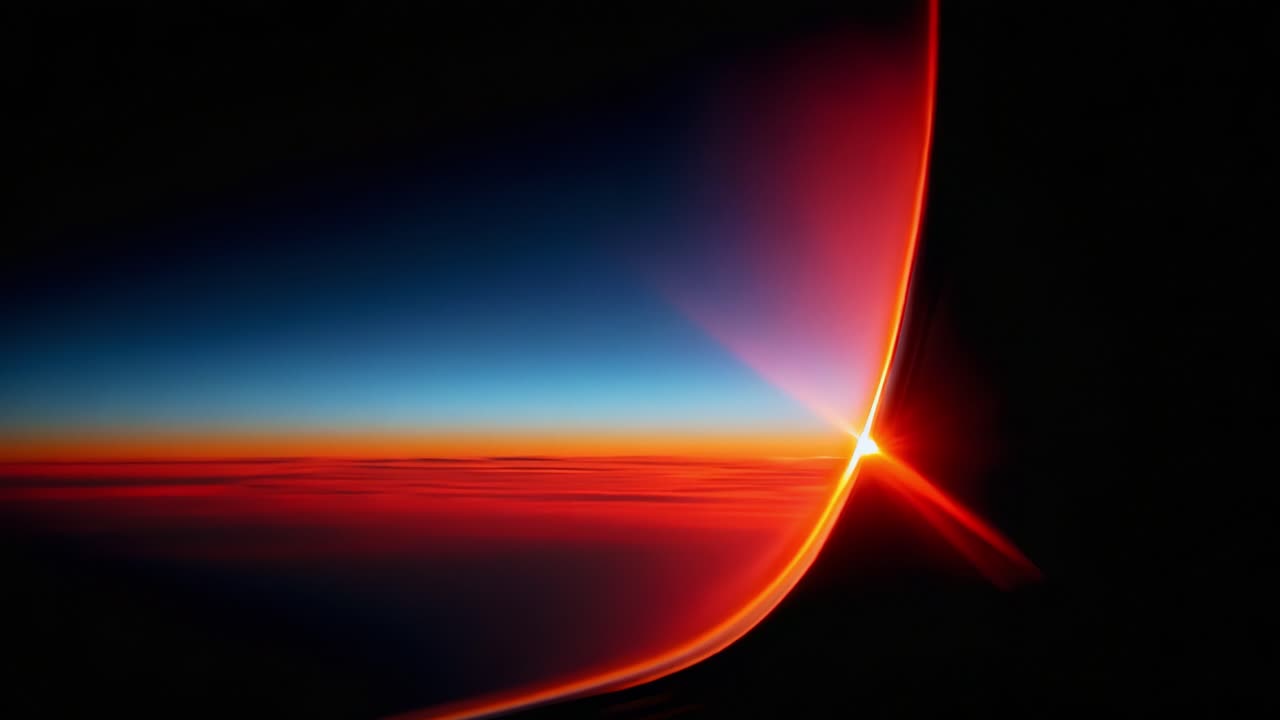 Stunning Capture of a Horizon at Sunrise: A Beautiful Fusion of Colors and Light Observed from an Aircraft Window in the Early Morning Sky