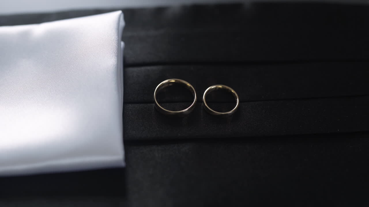 Wedding Rings on Tuxedo and Pocket Square