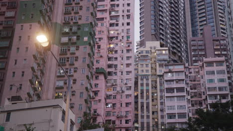 the captivating skyline of hong kong sheung wan with colorful residential buildings as twilight descends