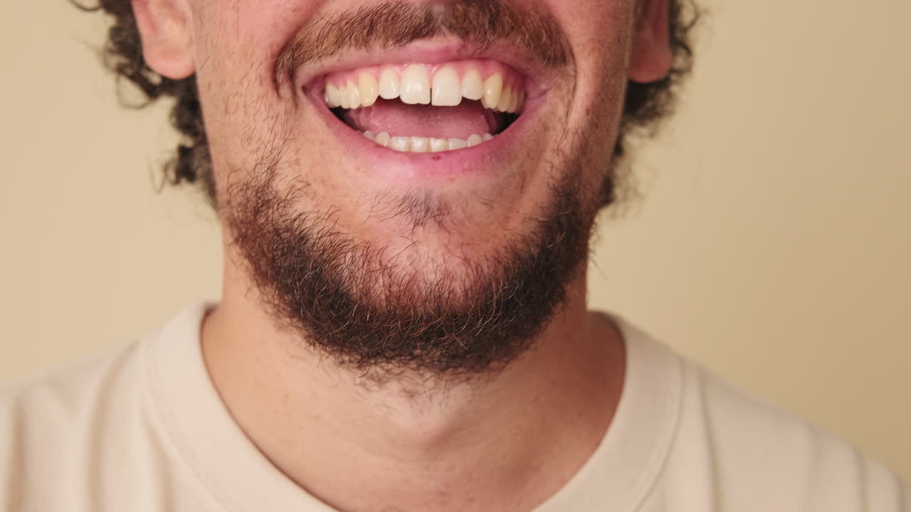 Close-up of a Man Smiling and Laughing