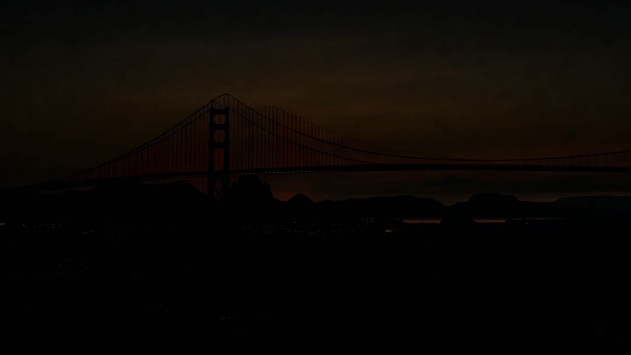 el amanecer ilumina el puente golden gate y la bahía de san francisco, proyectando un cálido resplandor sobre el icónico horizonte.