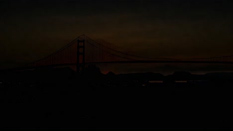 sunrise illuminates the golden gate bridge and san francisco bay, casting a warm glow over the iconic skyline