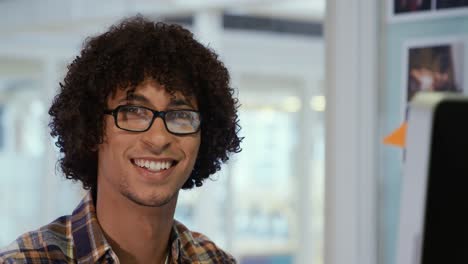 young man working in a creative office