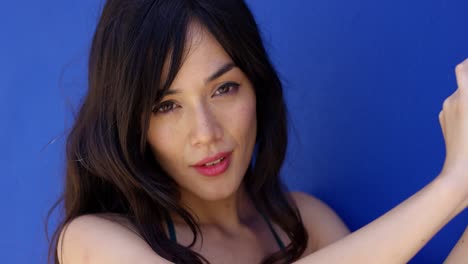 close up of woman with brown eyes and long hair