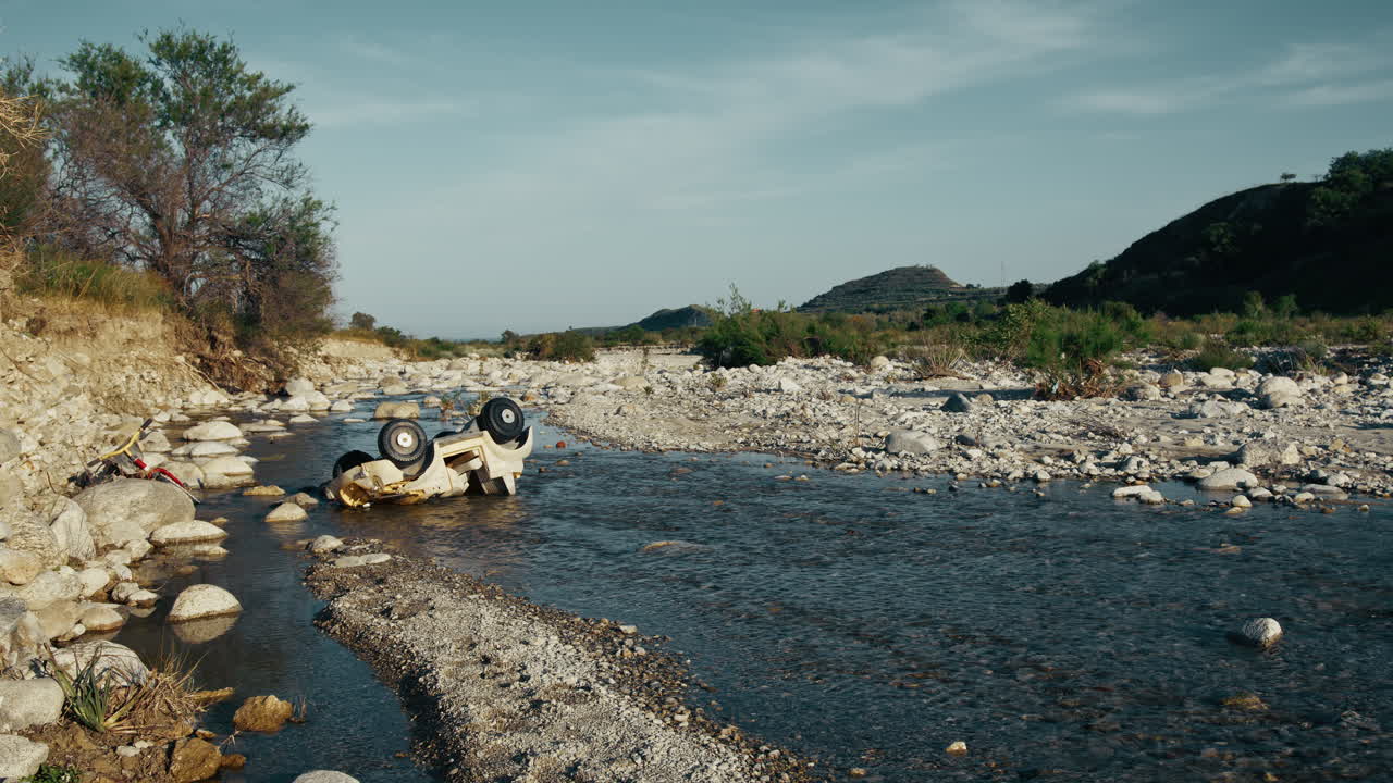 Melancholy Toy Car Abandoned In A River Dump With Water