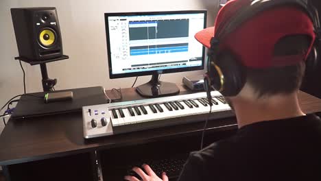 musician make music at his home studio