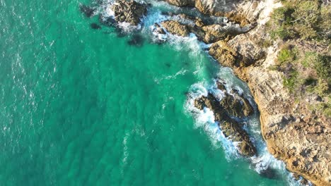 top down drone shot of stradbroke islands rocky coast line